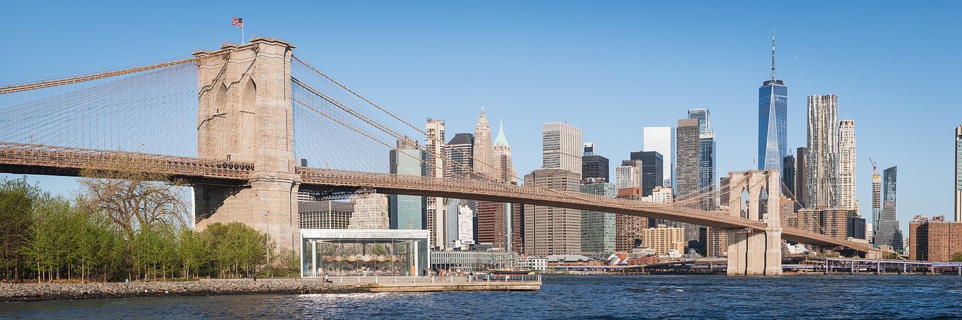 Brooklyn Bridge and the Lower Manhattan skyline seen from Pebble Beach.