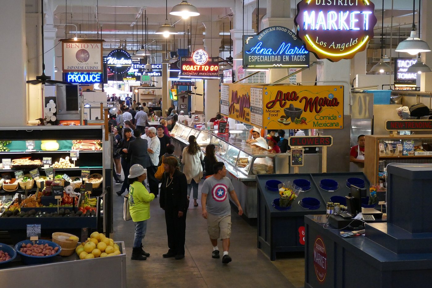 Stalls and signs inside Los Angeles's Grand Central Market.