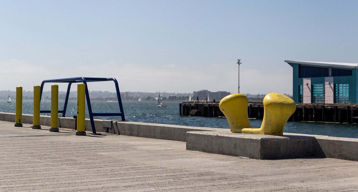 A pier and waterfront walkway on San Diego's Embarcadero.
