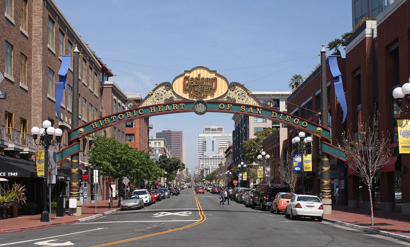 The Gaslamp Quarter gateway above a San Diego street.