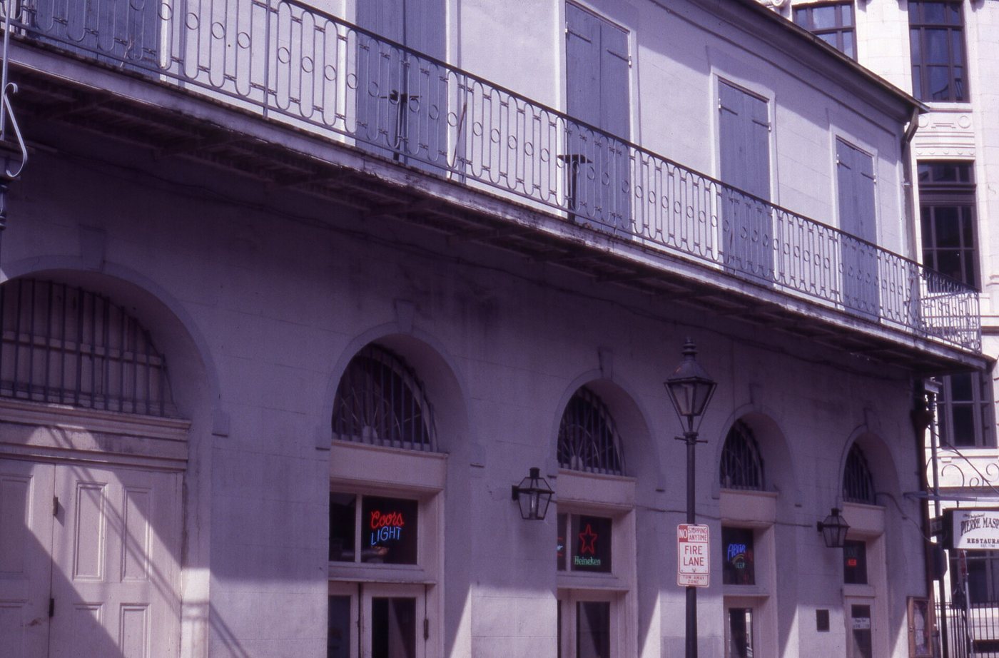 Balconies and shuttered openings in New Orleans's French Quarter.