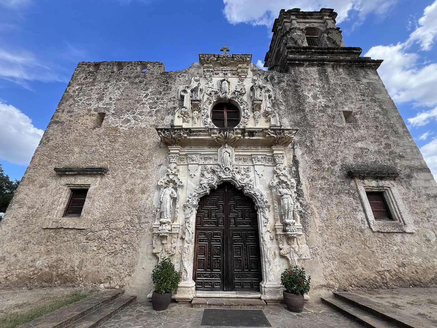 The carved stone entrance of Mission San José in San Antonio.
