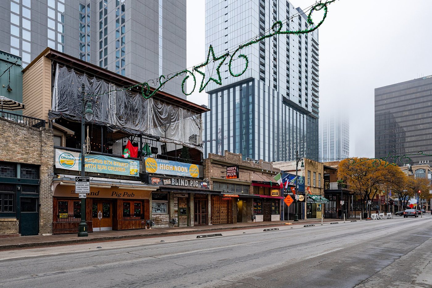 Historic commercial facades along Sixth Street in Austin.