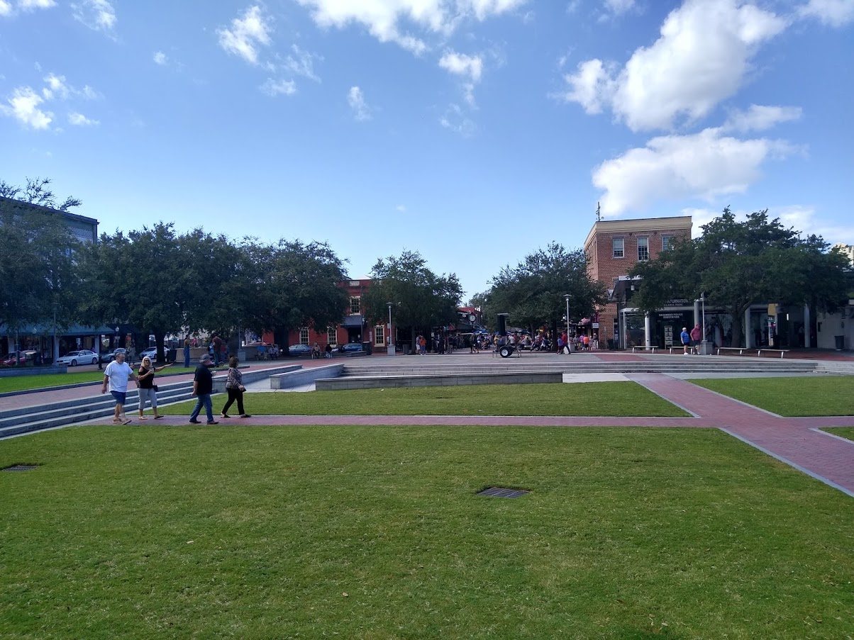 Paths, lawns and surrounding street frontages at Ellis Square in Savannah, photographed in 2020.