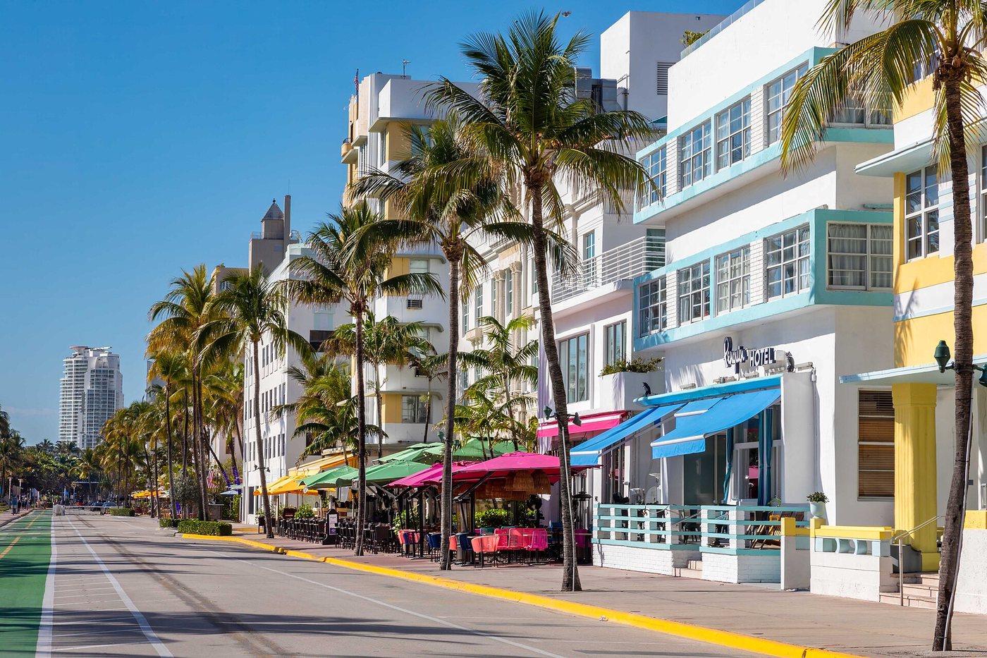 Art Deco facades and palm trees along Ocean Drive in Miami Beach.