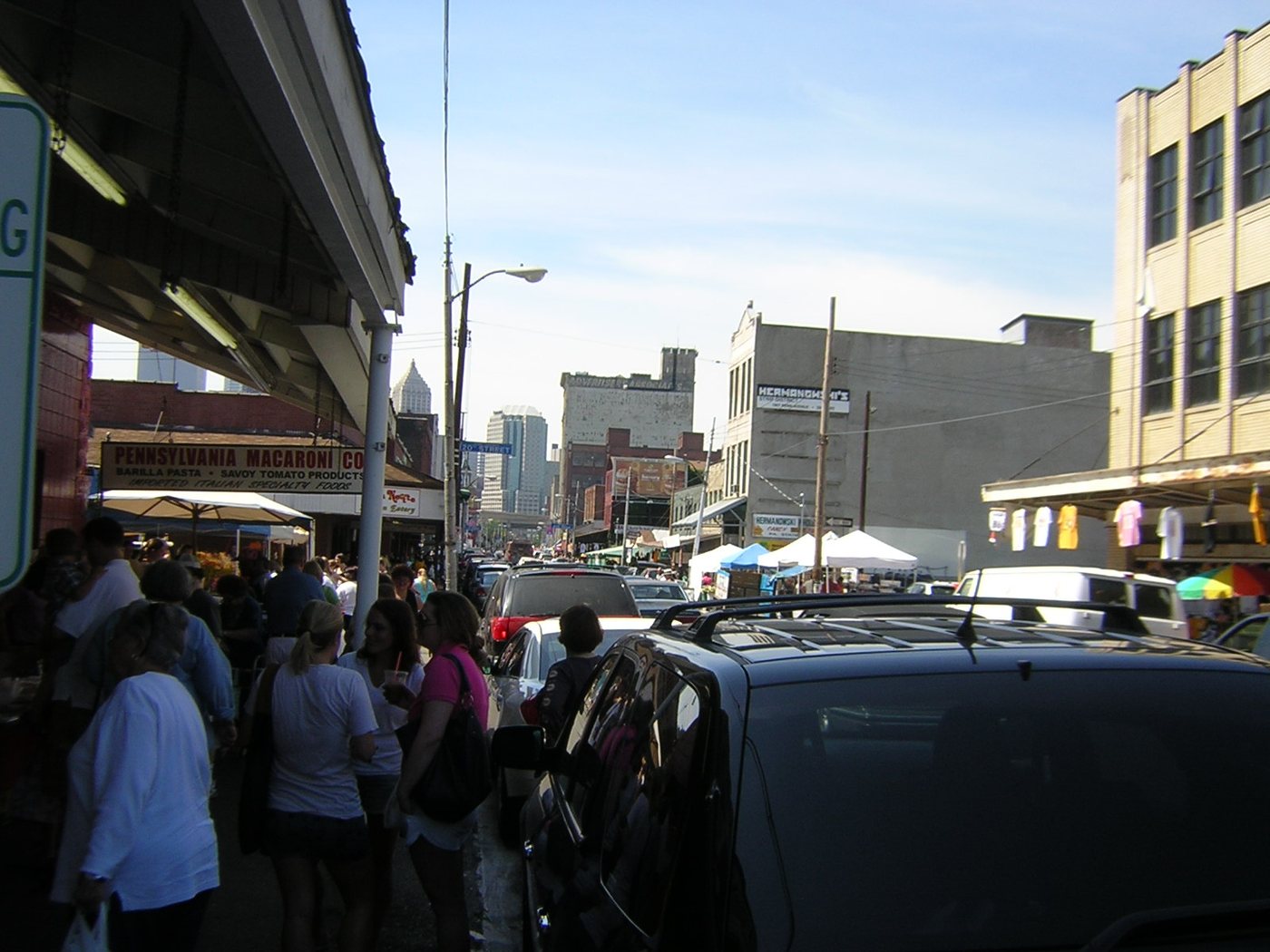 Food businesses and shoppers in Pittsburgh's Strip District.