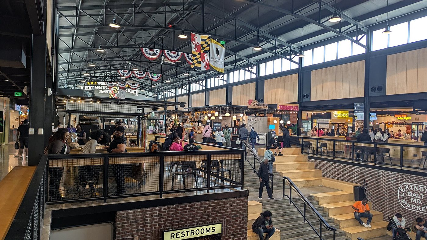 Food stalls and seating inside the new Lexington Market building in Baltimore.